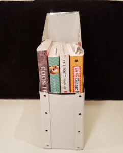 Magazine holder with cookbooks for kitchen organization