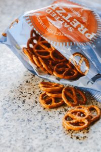 Open bag of pretzels. Stashing snacks helps avoid buying weekday lunch & saves money.